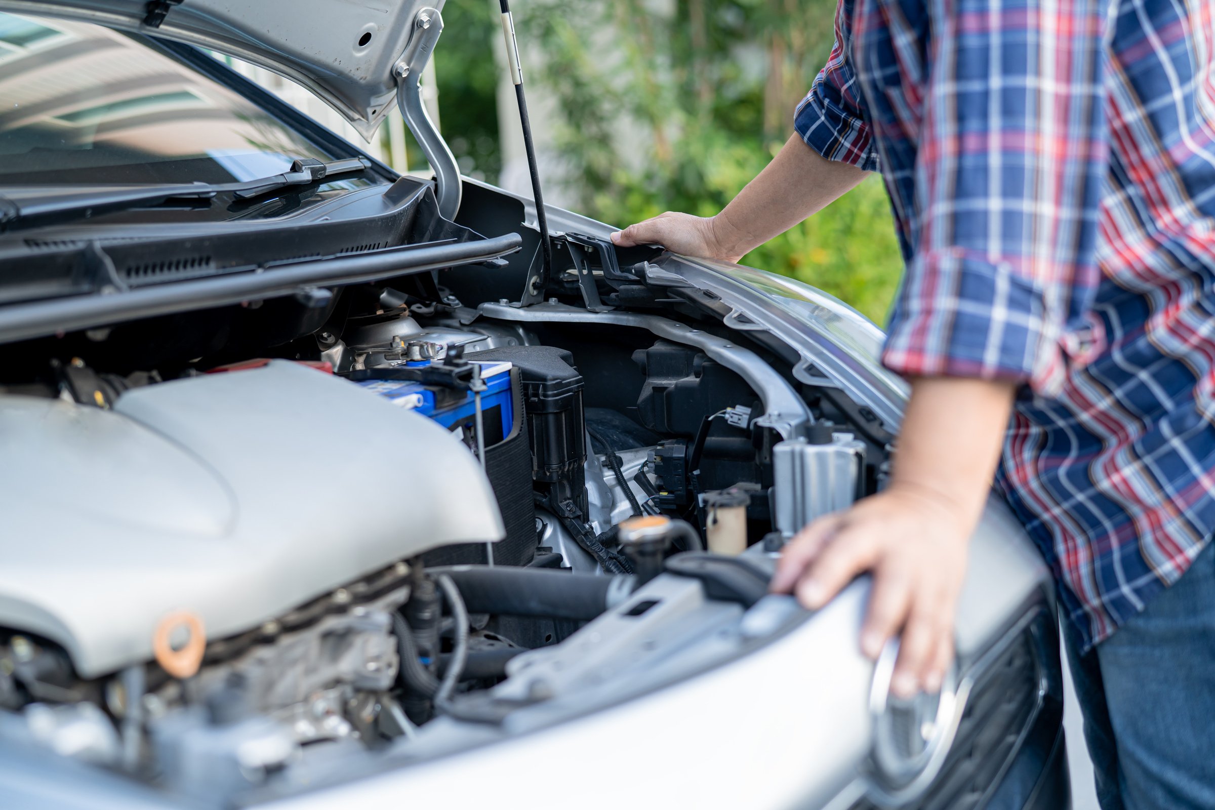 Open Hood Mechanic Engine System to Check and Repair Damage Car